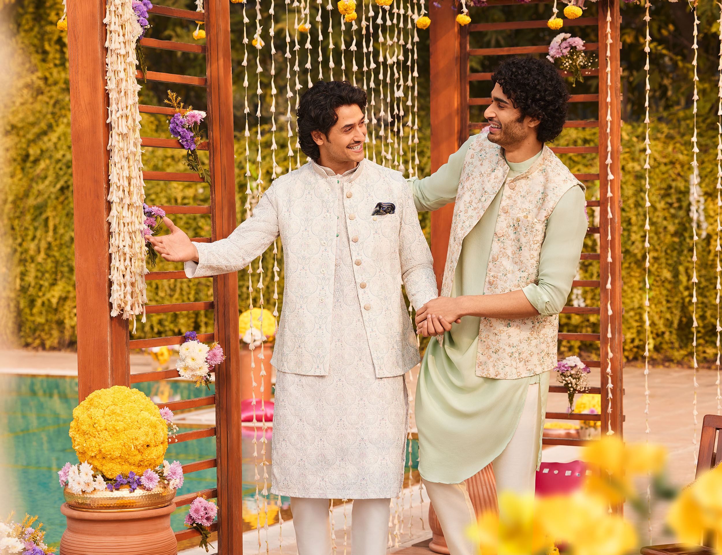 Men faunting their beautifull kurta jacket set for sangeet ceremony